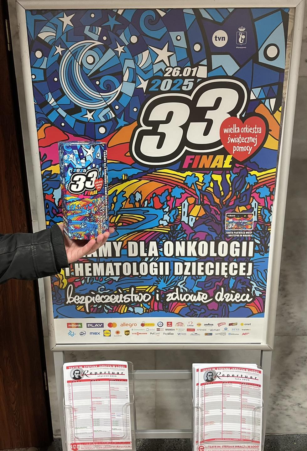 plakat WOŚP i puszka